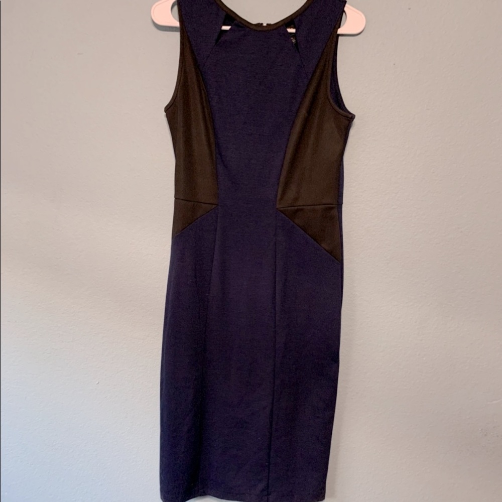 Navy dress with leather cutouts